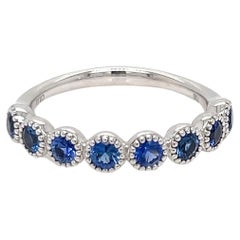 0.83 Carats Sapphire half eternity ring in Pave Bead setting 