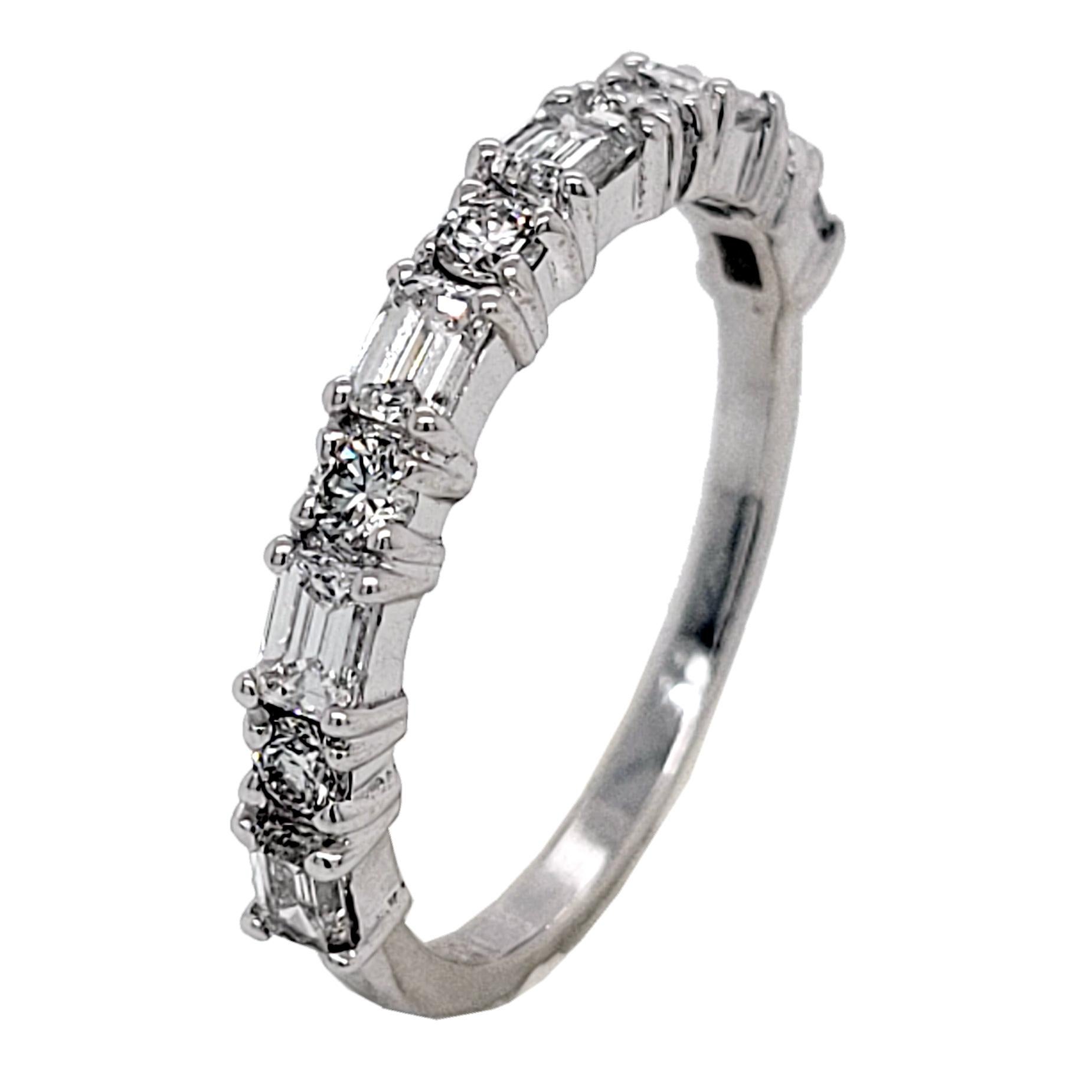 This beautiful Anniversary Ring is made in 18K White Gold showcasing 5 perfectly matched VS/E-F Emerald Cut and 6 Round Brilliant Diamonds Set in Shared Prong Mode.
Total Weight of diamonds: 0.83 Ct Clarity: VS, Color: E-F
Total Weight of the Ring: