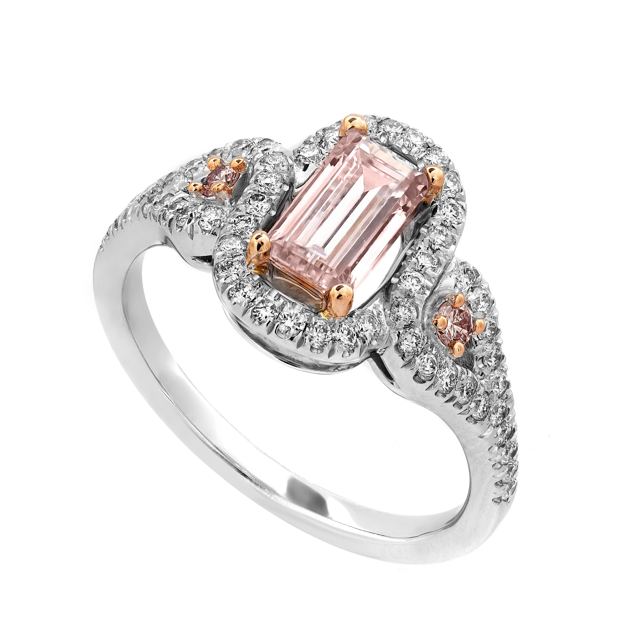 Experience elegance personified with this exquisite ring adorned by a striking 0.83 carat Fancy Pink Diamond, boasting a remarkable VS2 Clarity. Renowned as some of the rarest and most coveted gemstones globally, Pink Diamonds exude unparalleled