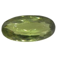 0.83ct Ovaler gelblich grüner bis gelblich brauner Alexandrit aus Sri Lanka