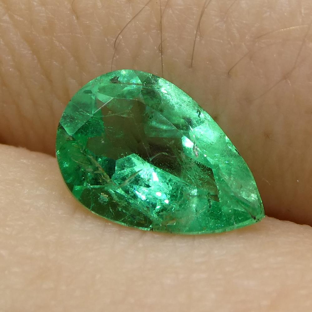 Description:

Gem Type: Emerald 
Number of Stones: 1
Weight: 0.83 cts
Measurements: 8.31 x 5.67 x 3.48 mm
Shape: Pear
Cutting Style Crown: Brilliant Cut
Cutting Style Pavilion: Modified Brilliant Cut 
Transparency: Transparent
Clarity: Slightly