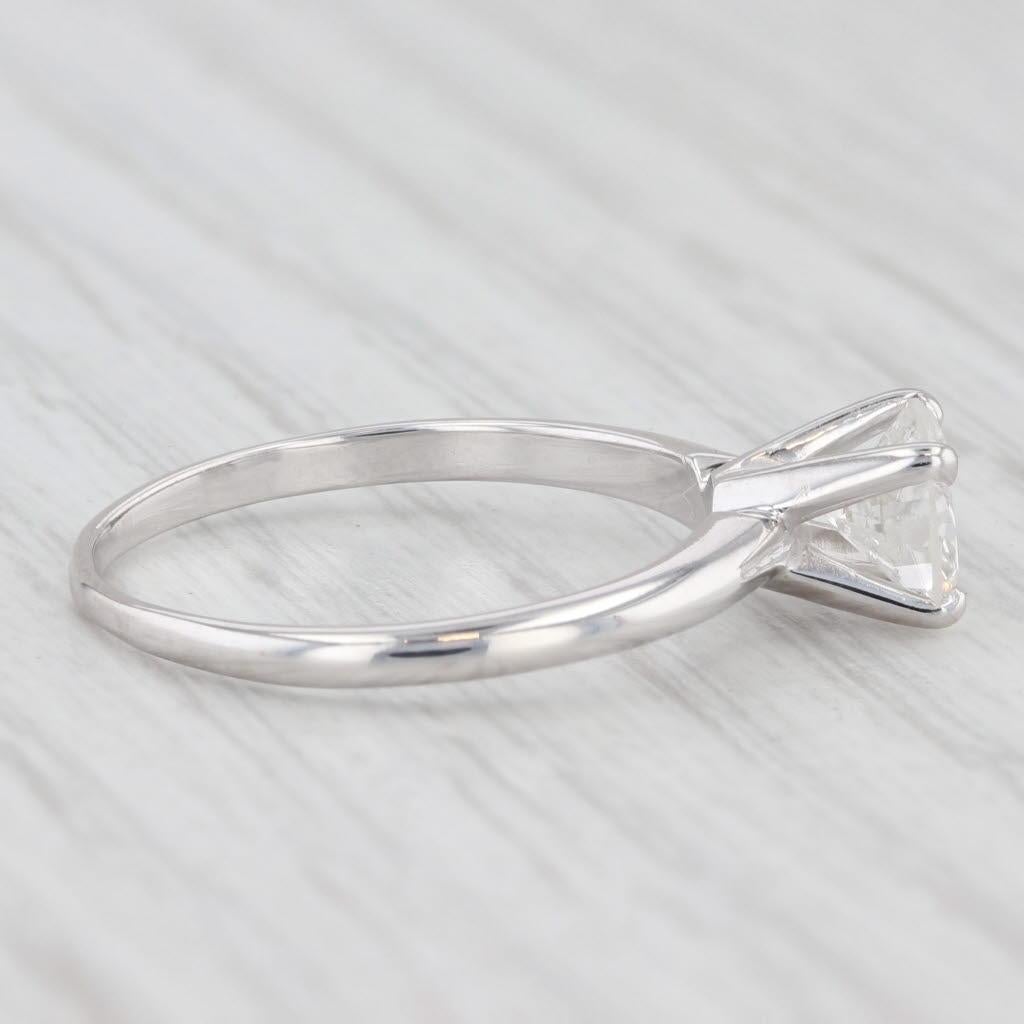 Gemstone Information:
- Natural Diamond -
Carats - 0.83ct 
Cut - Round Brilliant
Color - E - F
Clarity - I2
Please note there are cavities.

Metal: 14k White Gold
Weight: 2.1 Grams 
Stamps: 14k (stamp is light)
Face Height: 6 mm 
Rise Above Finger: