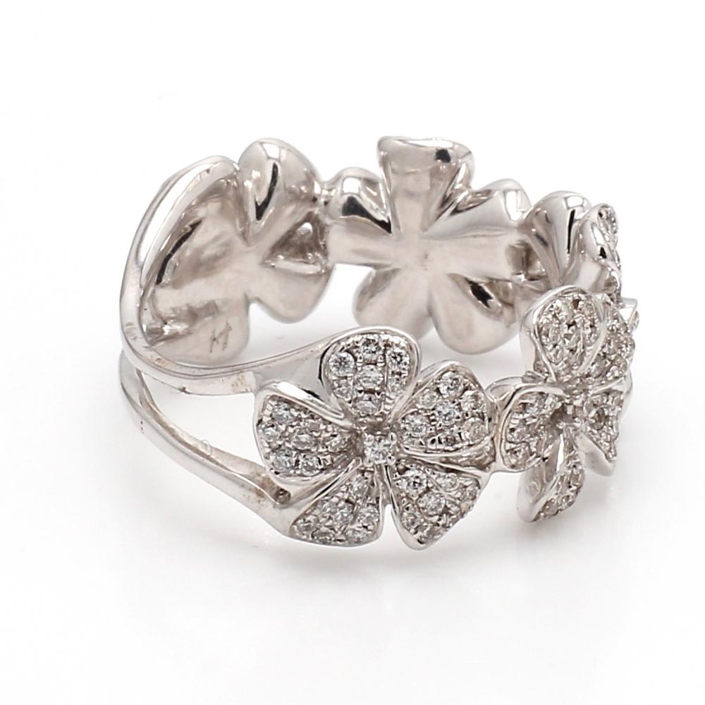 18K white gold, diamond flower ring. Ring is set with one hundred seventy-seven ( 177 ) round brilliant cut diamonds weighing 0.83ctw. Ring weighs 8.0 grams and is a size 6.5. 
All questions answered. 
All reasonable offers are considered!