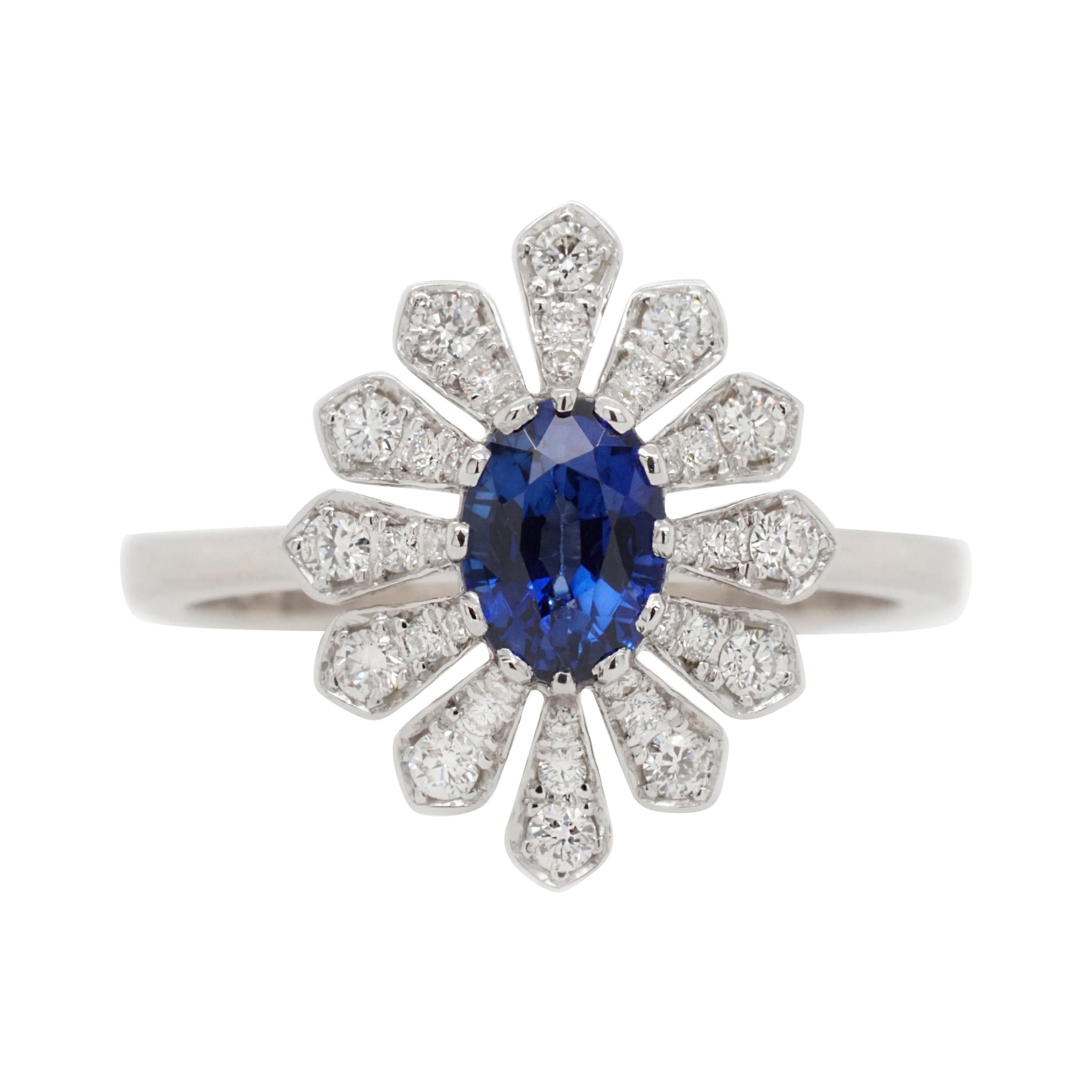 0.84 Carat Blue Sapphire and Diamond Flower Ring For Sale
