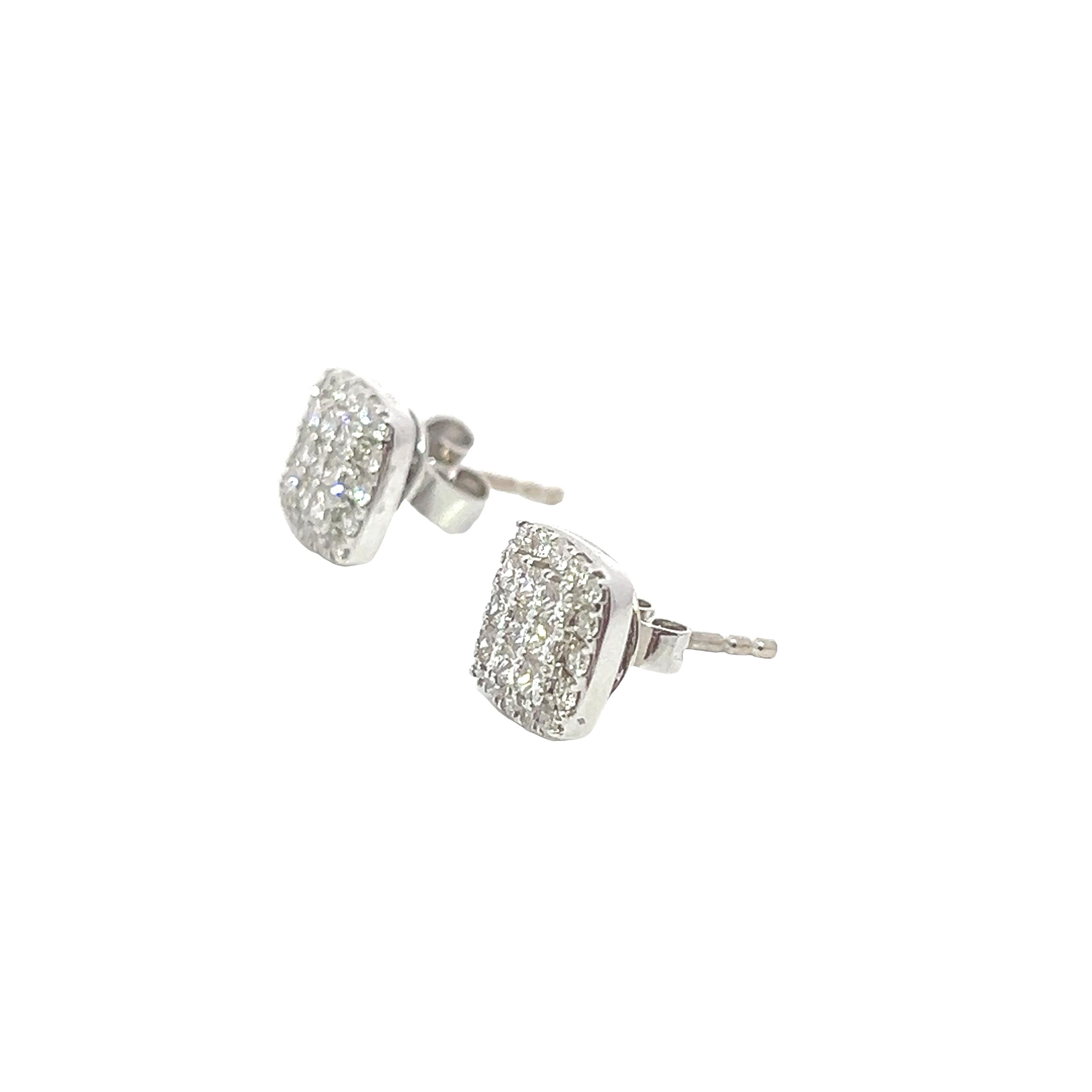 These square cluster earrings will never go out of style. Each piece of earring has differently cut diamonds: 9 Princess Cut stones in the center surrounded by 16 Round Cut stones.

Center Diamonds: 0.52CT Total  RBC  D  VVS2  
Side Diamonds: 0.32CT
