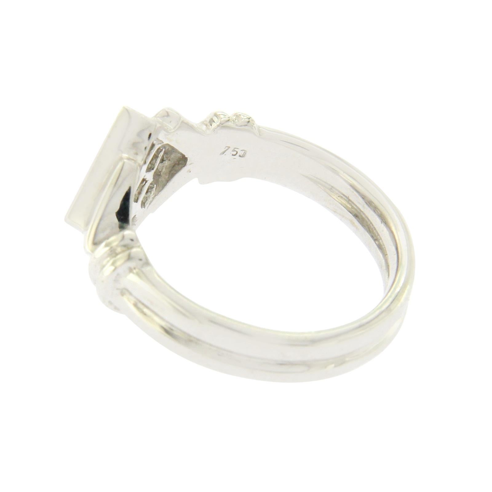 Type: Ring
Top:11 mm
Band Width: 3.8 mm
Metal: White Gold
Metal Purity: 14K
Size:5.5
Hallmarks: 750
Total Weight: 6.2 Grams
Stone Type: 0.84 CT Invisible Set Princess Cut Diamonds G VS1
Condition: Pre Owned
Stock Number: BL120