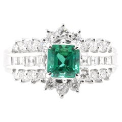 0.84 Carat Natural Vivid Green Emerald and Diamond Ring Set in Platinum