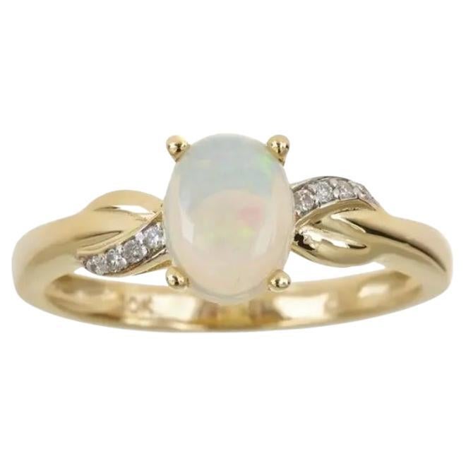 0.84 Carat Oval-Cab Ethiopian Opal Diamond Accents 10K Yellow Gold Ring For Sale