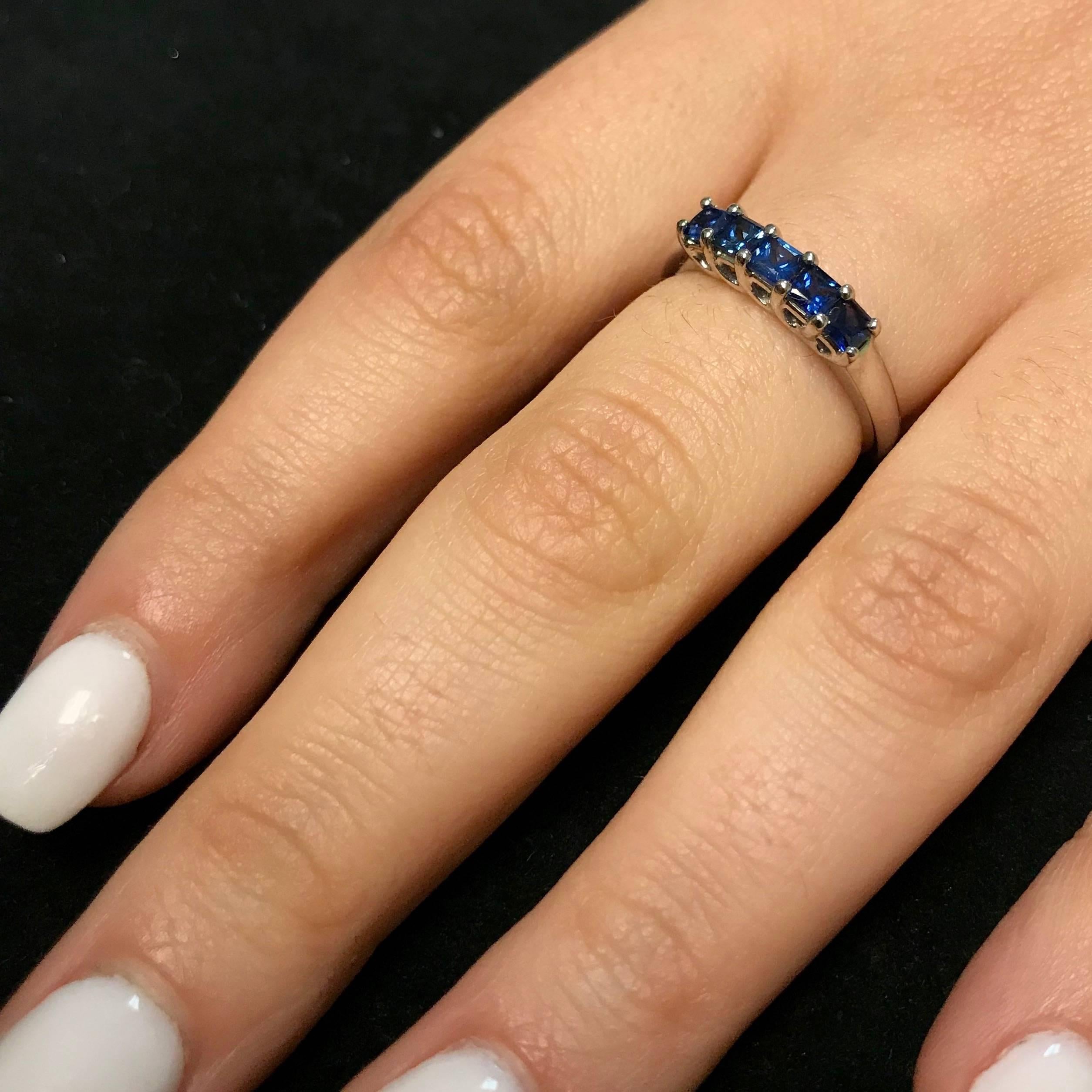 A beautiful and colorful piece, this ring features 5 princess cut blue sapphires encased in 14K White Gold.

Material: 14k White Gold
Gemstones: 5 Princess Cut Blue Sapphires at 0.84 Carats. Measuring 3mm.
Ring Size: 6. Alberto offers complimentary