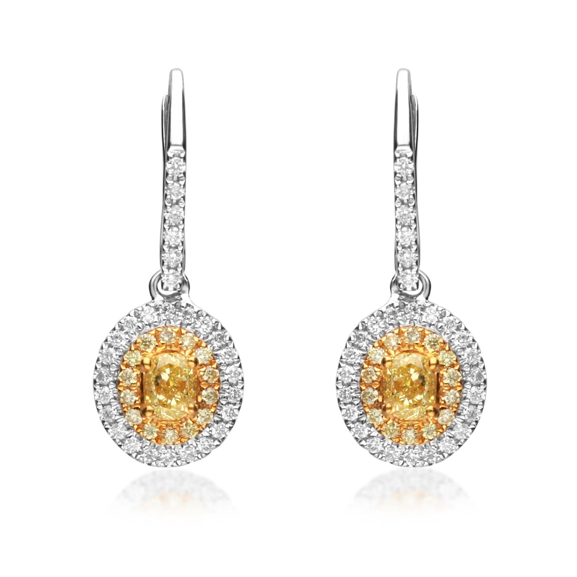 This beautiful pair of 18kt two tone Yellow diamond earrings by Gin and Grace has center of 2 oval cut Yellow diamonds 0.66 ct. SI quality, surrounded by 28 smaller yellow diamonds 0.18 ct. and 56 round brilliant cut white diamonds 0.37 carat GH -SI