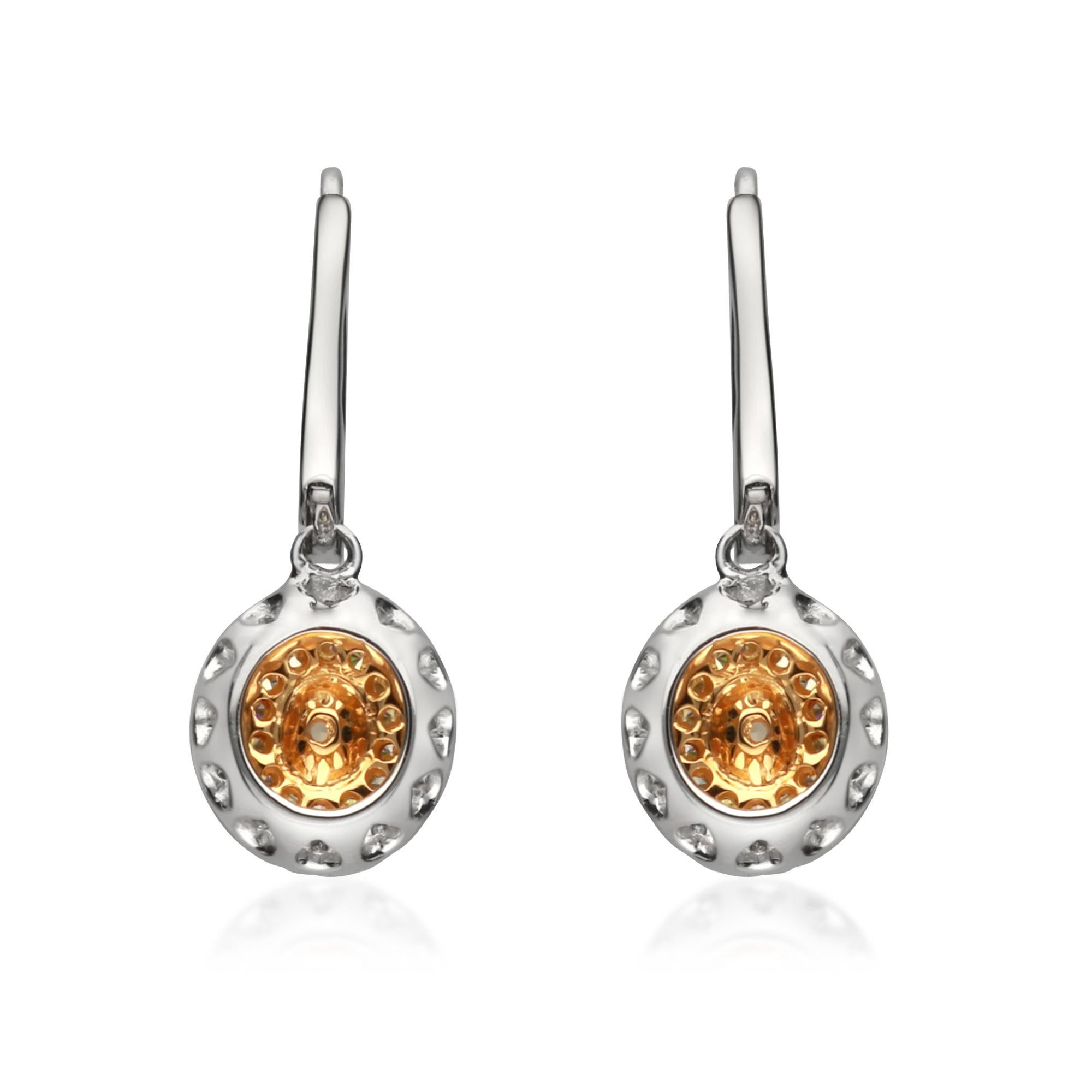 Modern 0.84 Carat T.W. Yellow Diamond 18 Karat Two-Tone Gold Earrings