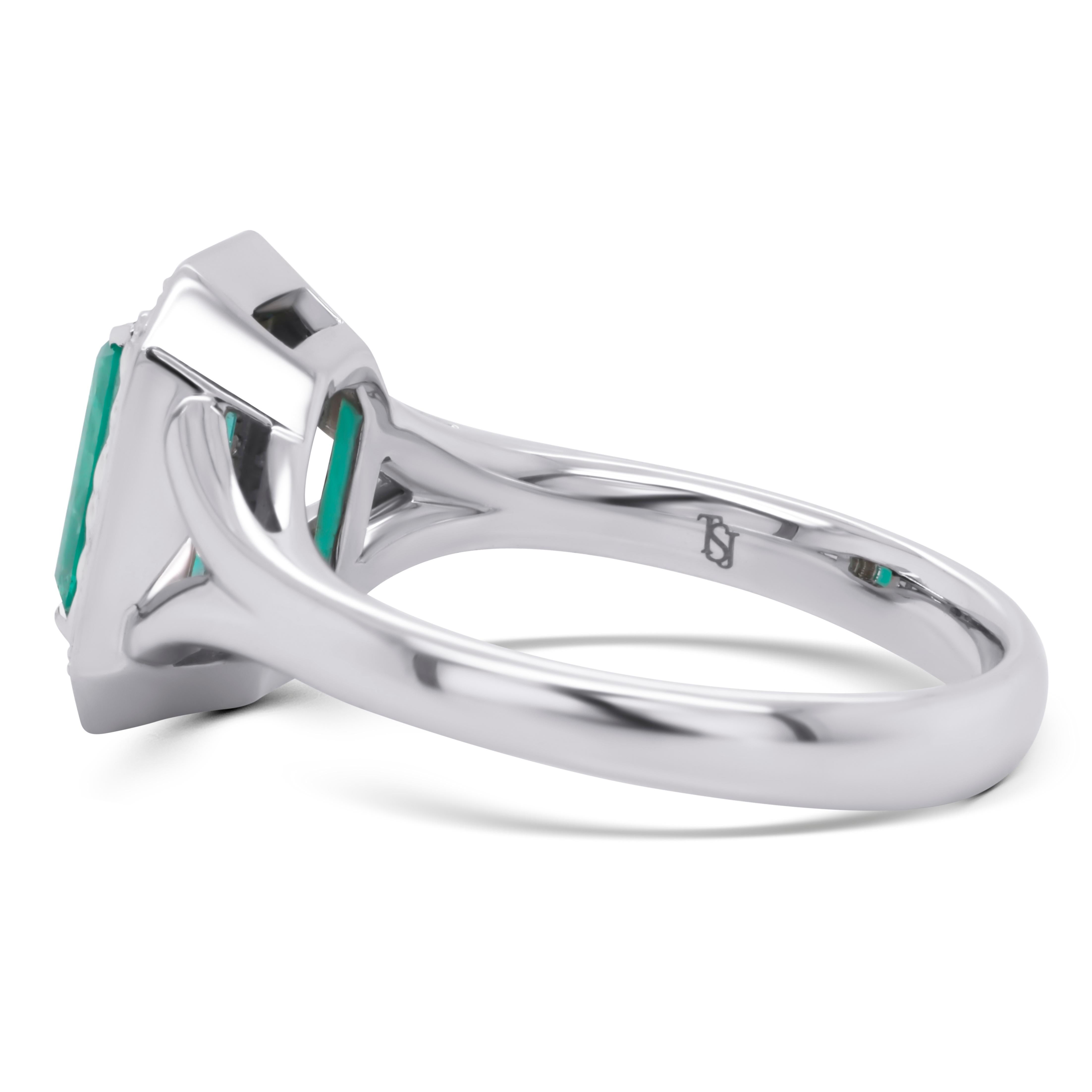 A classic emerald cut Emerald enclosed in a timeless design Ring.

The center stone is a saturated green Emerald from the Ural Mountains, Russia – a picturesque region with a rich history where these emeralds are sourced and prized for their rarity