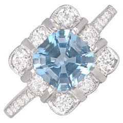 Bague de fiançailles aigue-marine taille Asscher 0,84 carat, halo floral en diamants et platine
