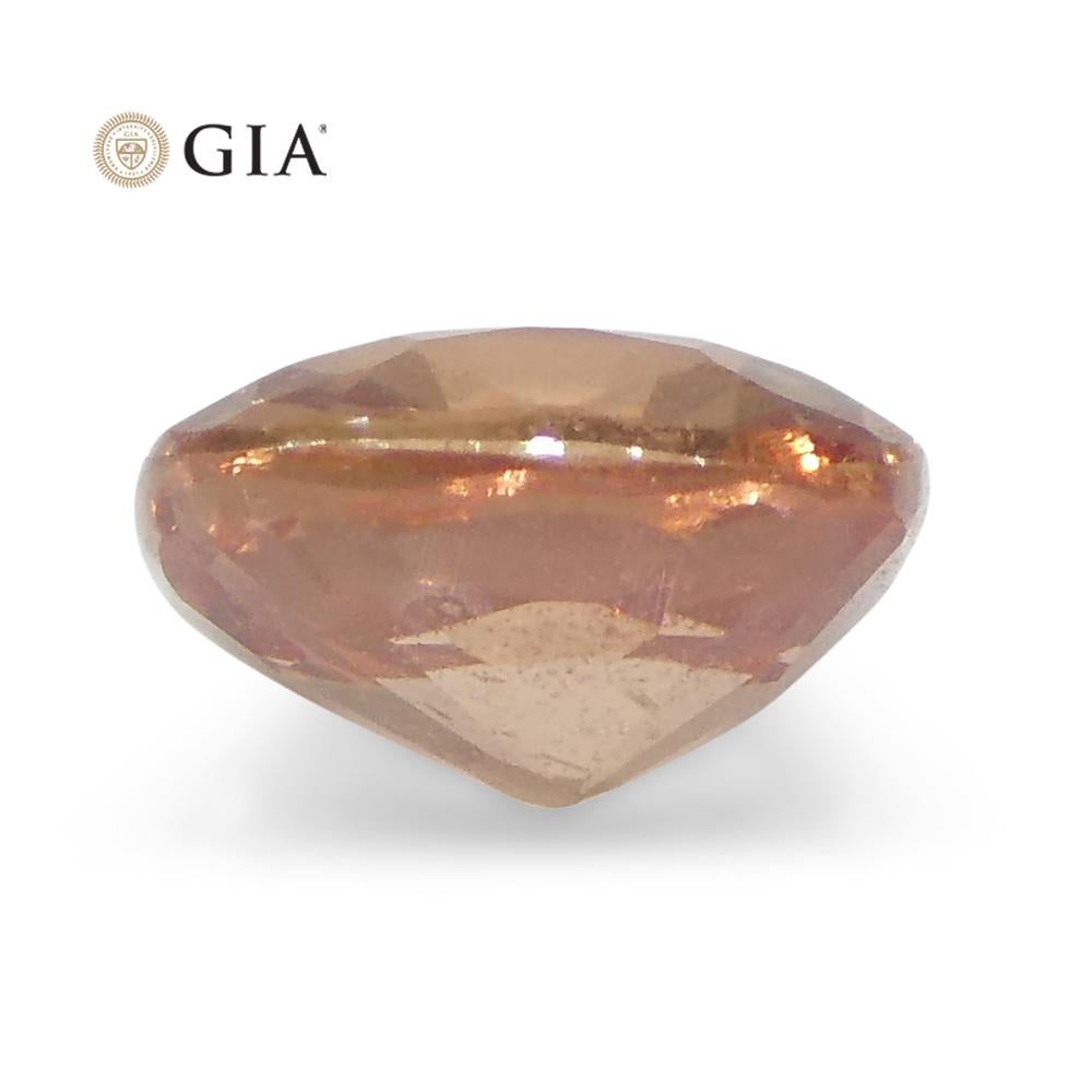 0.84 Carat Cushion Orangy Pink Padparadscha Sapphire GIA Certified Madagascar For Sale 1