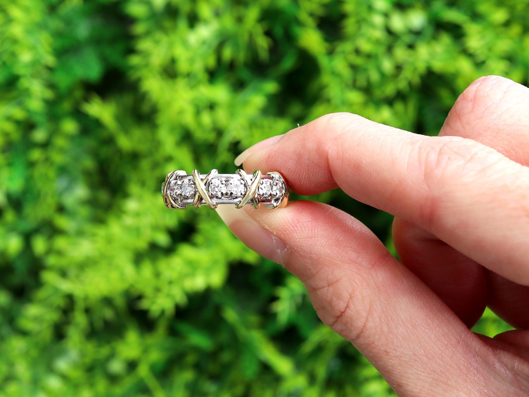 A stunning, fine and impressive contemporary 0.84 carat diamond, 18 karat white gold and 18 karat yellow gold set Jean Schlumberger's Design eternity ring; part of our diverse diamond Tiffany jewellery collection.

This stunning, fine and impressive