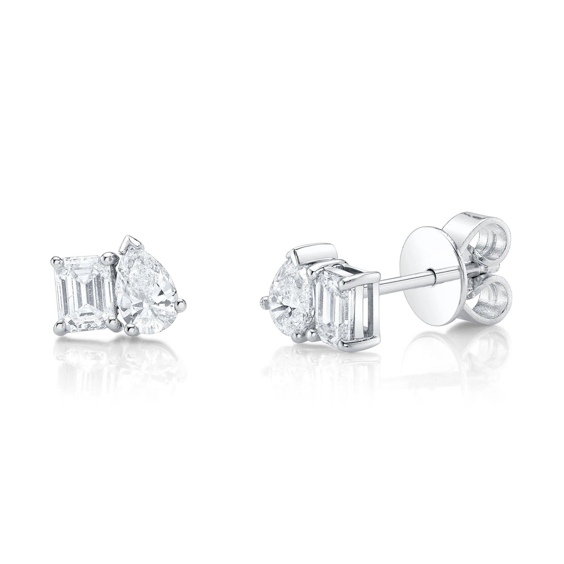 0.84ct Emerald Cut and Pear Shaped Diamond Toi Et Moi Stud Earrings For Sale