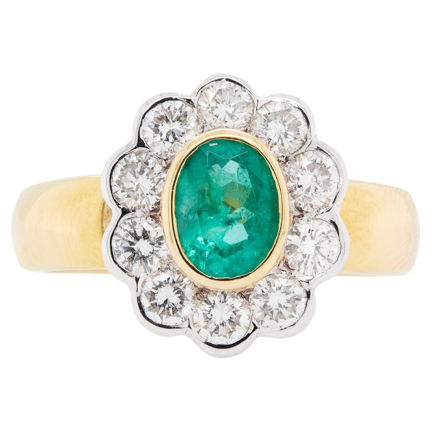 0.84ct Oval Emerald and Diamond Halo 18K Yellow and White Gold Cluster Ring