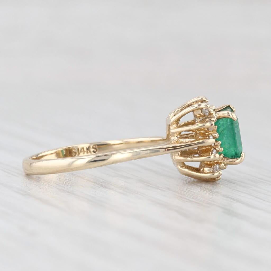 Gemstone Information:
- Natural Emerald -
Carats - 0.70ct
Cut - Emerald
Color - Green
Treatment - Oiling

- Natural Diamonds -
Total Carats - 0.14ctw
Cut - Round Brilliant
Color - H - I
Clarity - SI1 - VS2

Metal: 14k Yellow Gold
Weight: 2.8 Grams