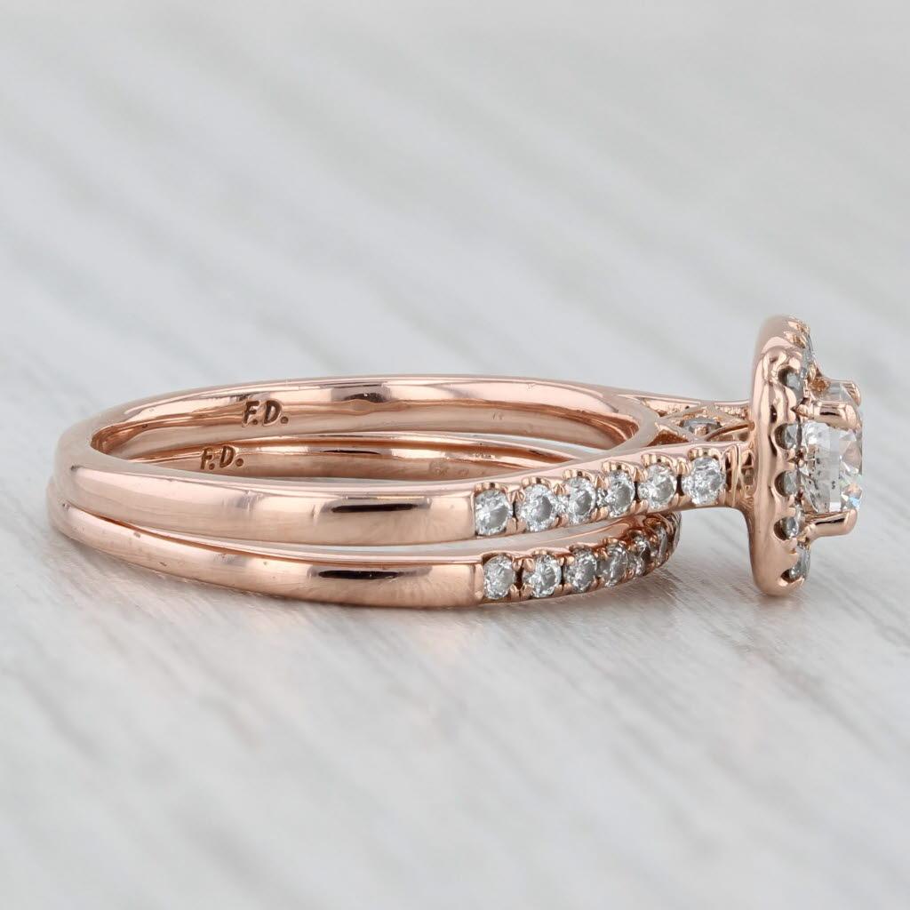 Gemstone Information: Natural Diamonds - 0.84 Total Carats
- Engagement -
Center
Carats - 0.41ct 
Cut - Round Brilliant
Color - G - H
Clarity - SI2 - I1

Halo
Total Carats - 0.11ctw 
Cut - Round Brilliant
Color - G - H
Clarity - I1

Accents
Total