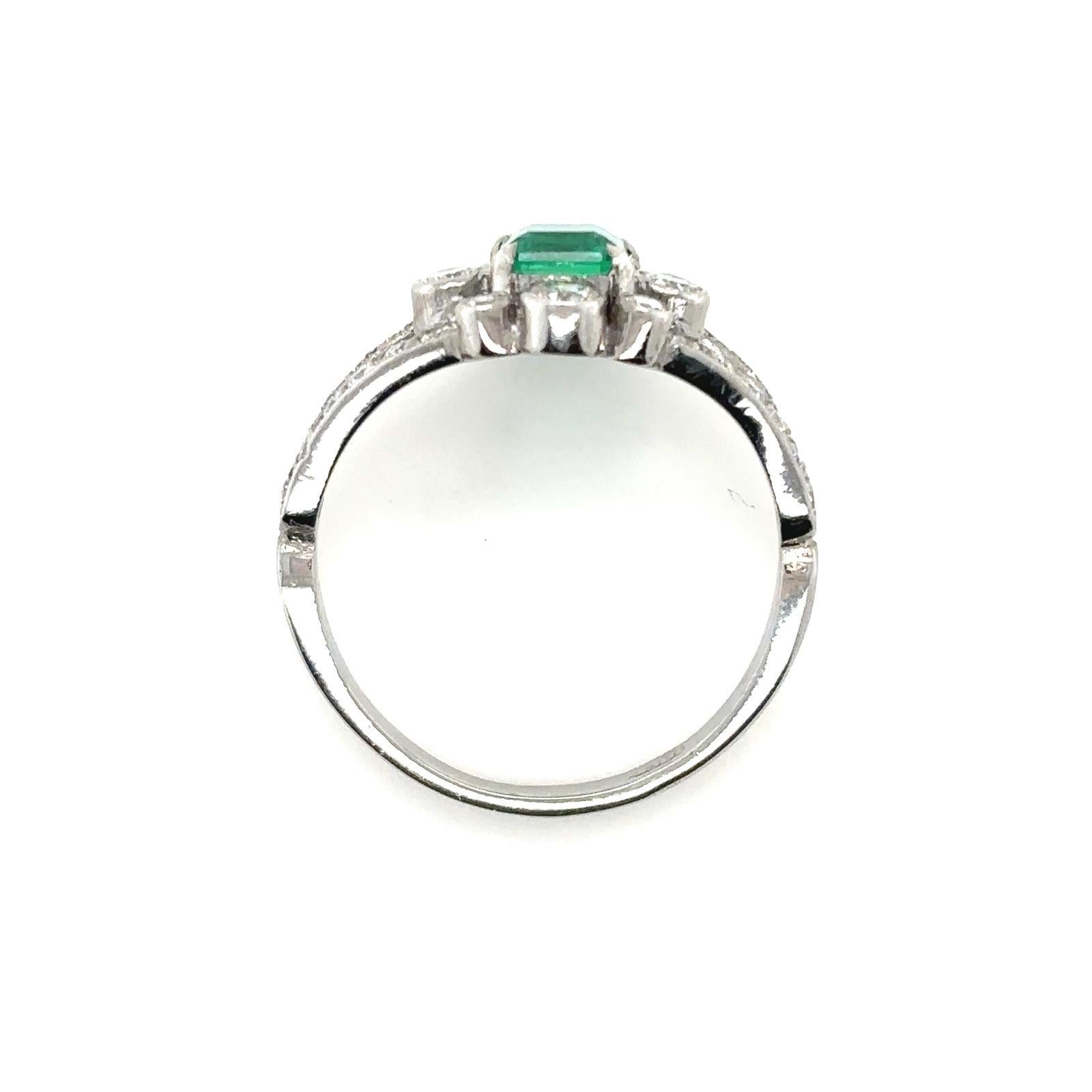 0.85 carat Columbian emerald and diamond 18 Karat White Gold Engagement Ring. For Sale 2