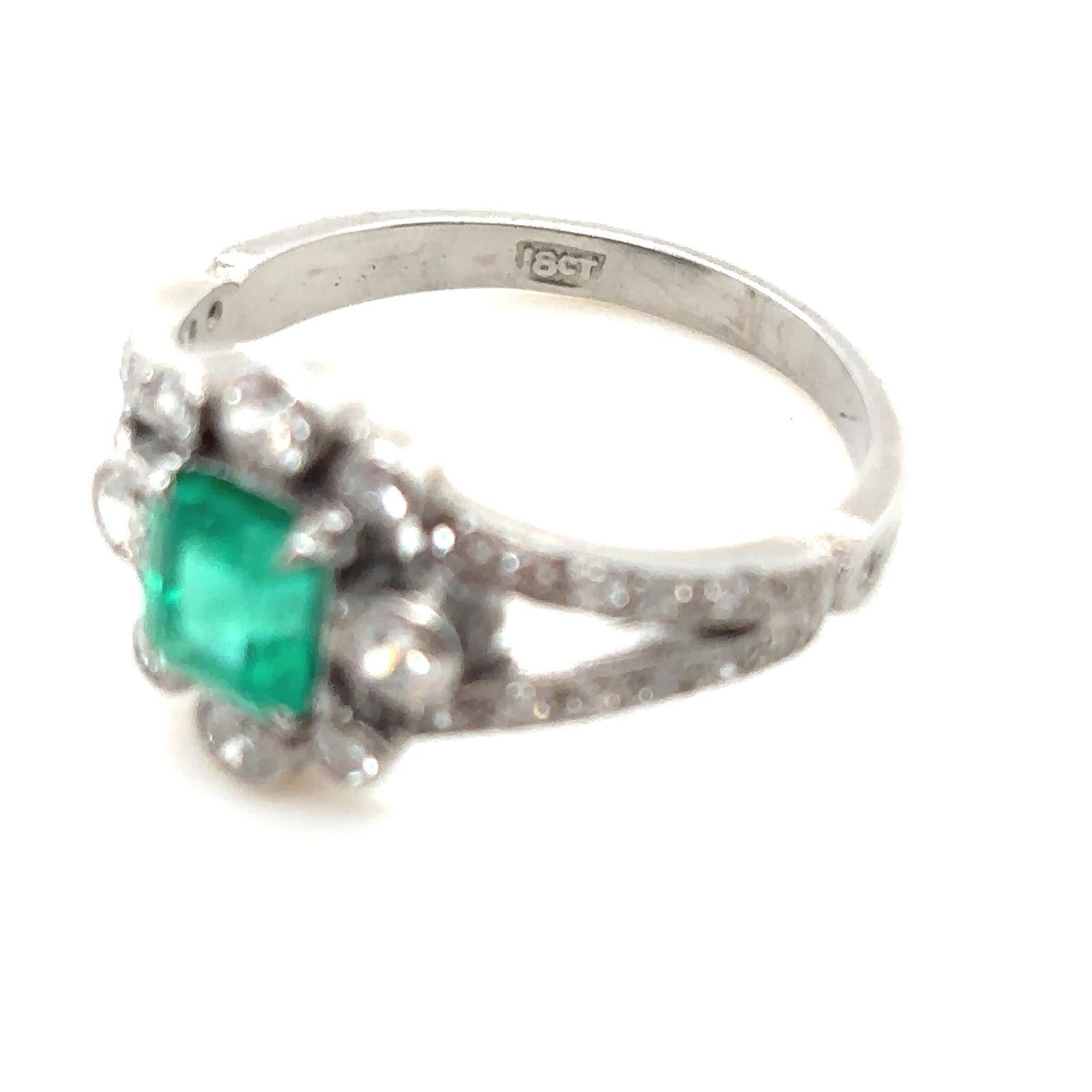 0.85 carat Columbian emerald and diamond 18 Karat White Gold Engagement Ring. For Sale 3