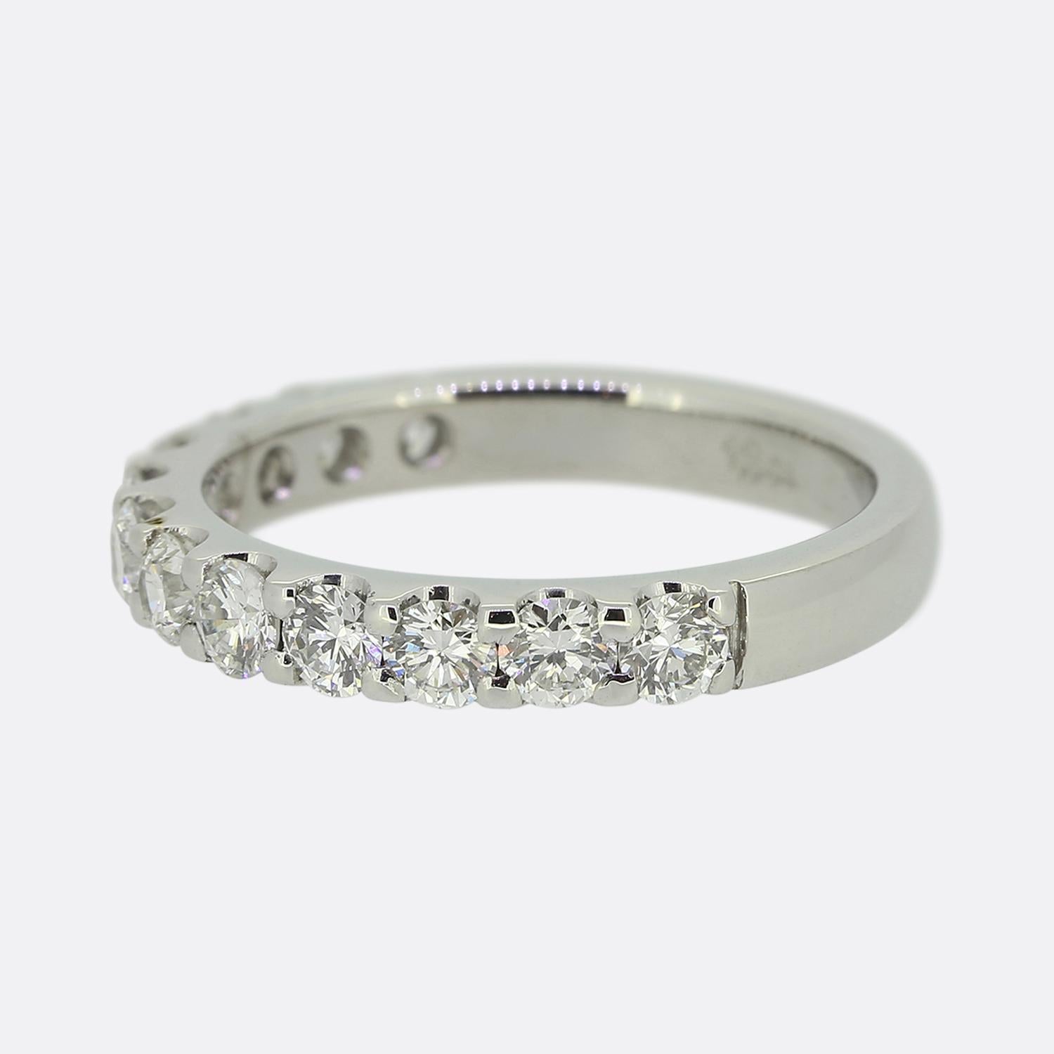 Here we have a wonderful, classically styled half eternity diamond ring. An 18ct white gold band plays host to 12 individually claw set round brilliant cut diamonds in a single line formation whilst the remainder of the shank has a plain polished