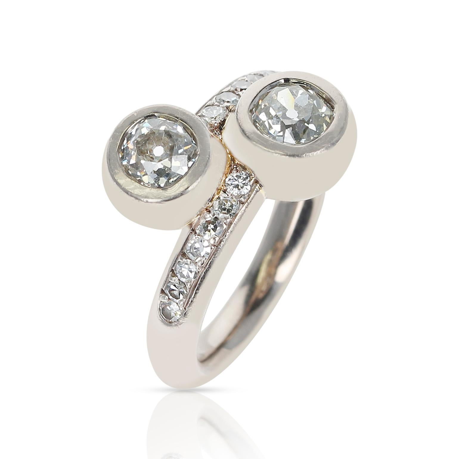 A 0.85 ct. each Two Round Diamonds Toi et Moi Ring. Ring Size US 8. Total Weight: 14.40 grams. The approximate color of the diamonds are F/G and the approximate clarity is VS1. 

