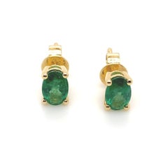 0.85 Carat Emerald Oval Cut Stud Earrings 18 Karat Yellow Gold