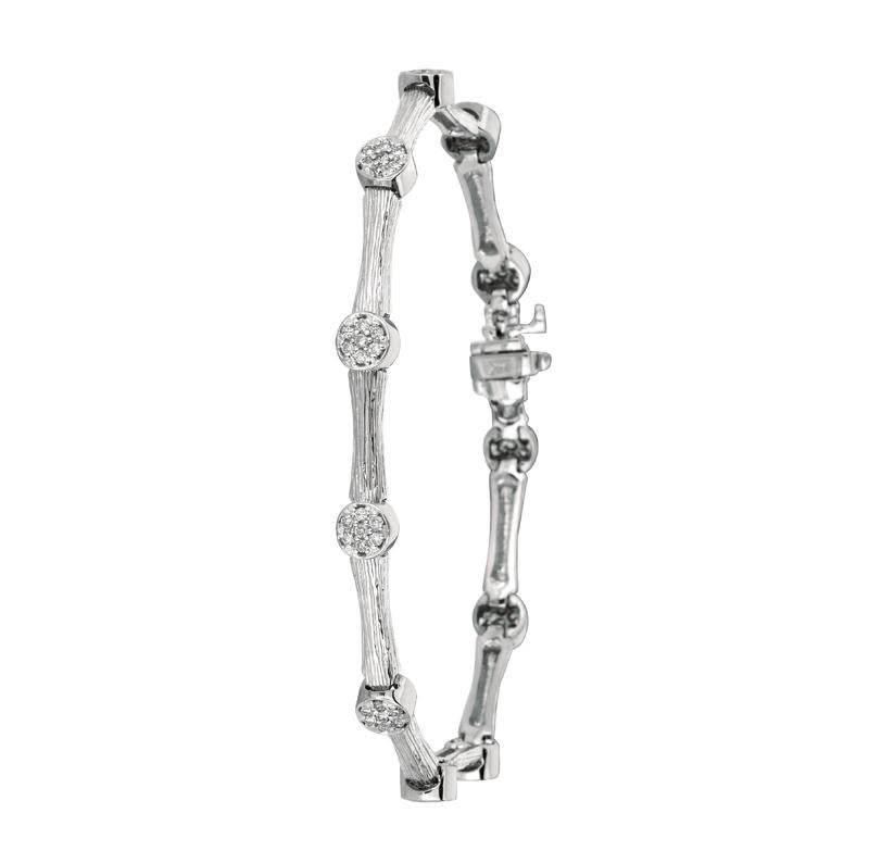 0.85 Carat Natural Diamond Bracelet G SI 14K White Gold 7 inches

100% Natural Diamonds, Not Enhanced in any way Round Cut Diamond Bracelet
0.85CT
G-H
SI
14K White Gold, Pave Style, 11.10 grams
7 inches in length, 3/16 inches in width
77