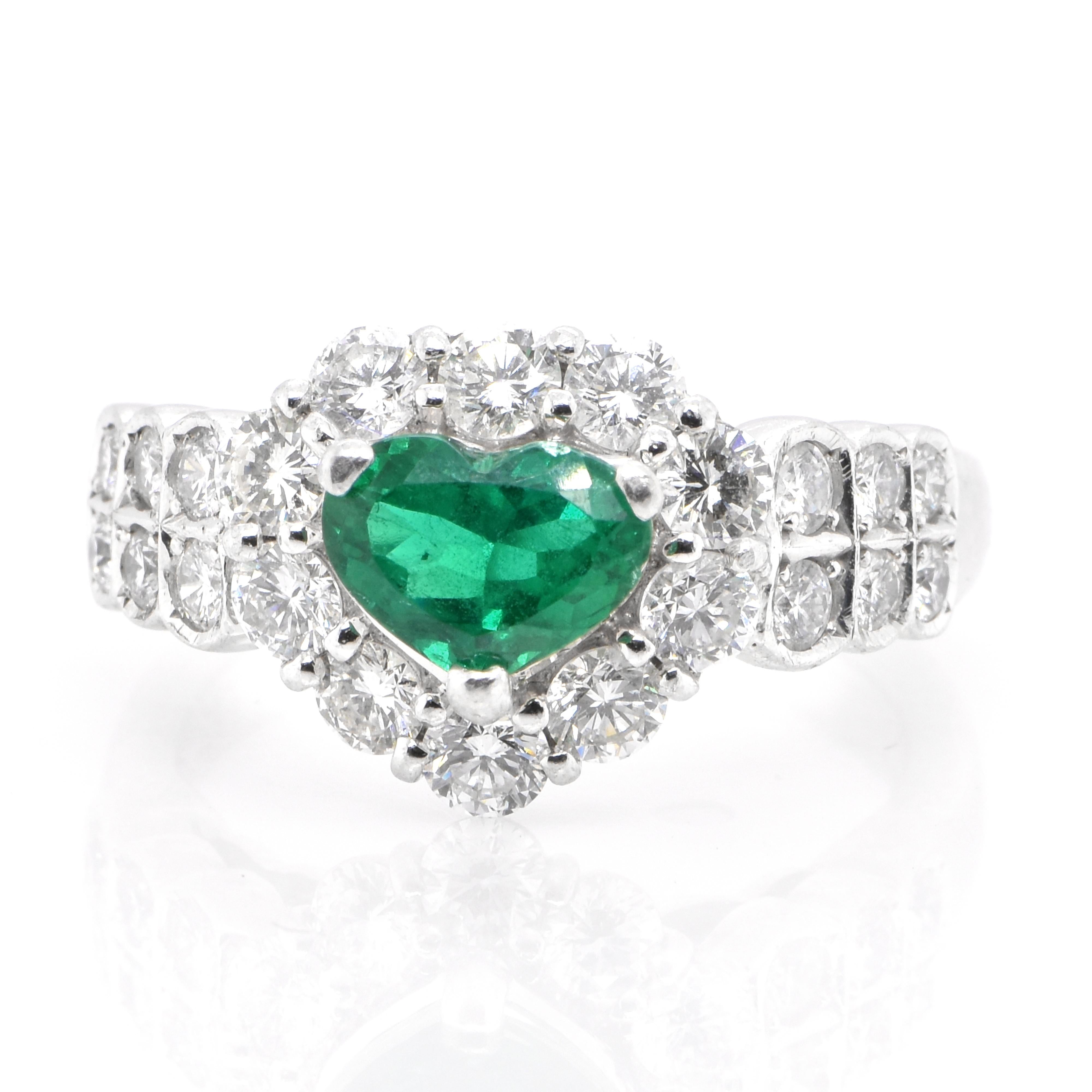 A stunning ring featuring a 0.85 Carat Natural Emerald and 1.23 Carats of Diamond Accents set in Platinum. People have admired emerald’s green for thousands of years. Emeralds have always been associated with the lushest landscapes and the richest