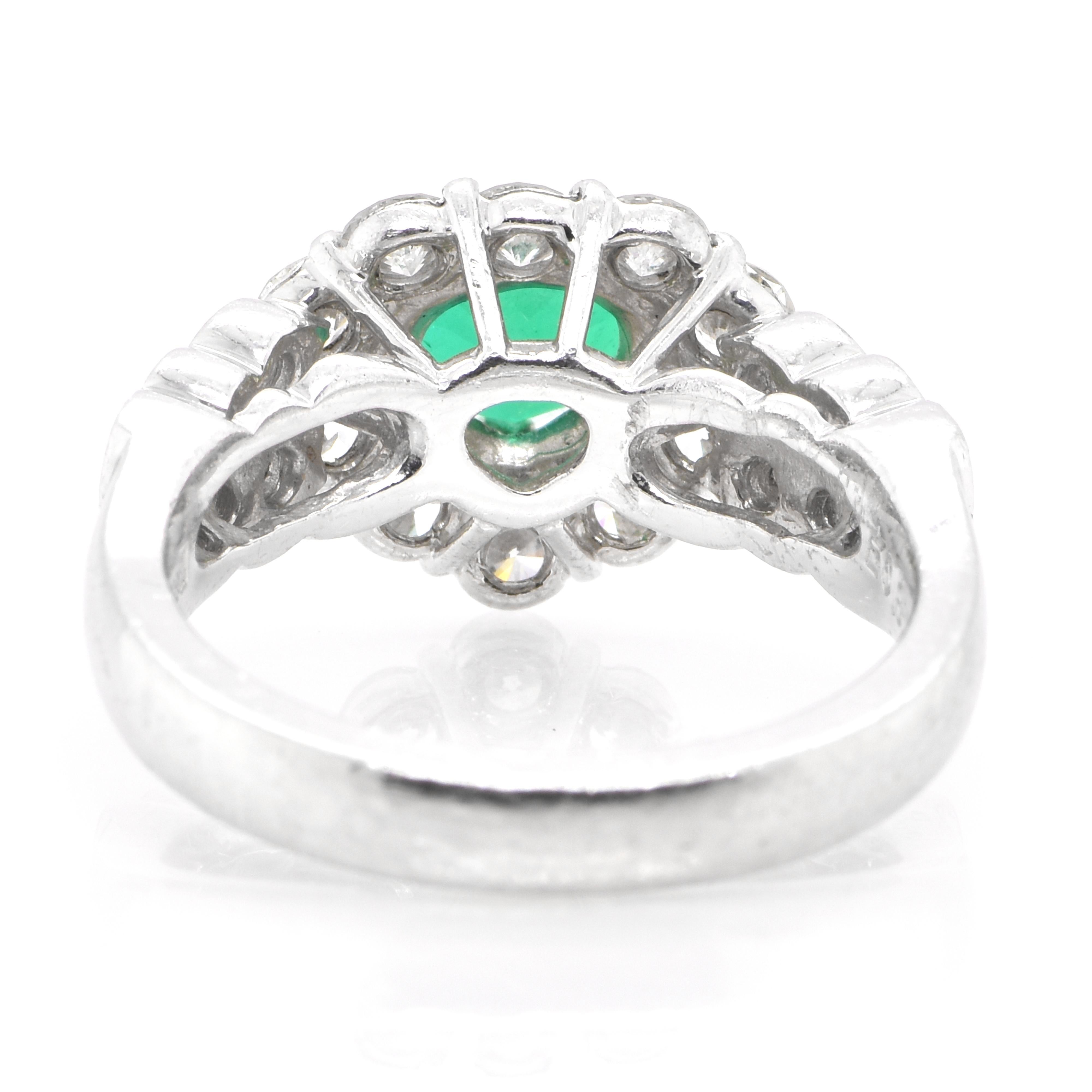 0.85 Carat Natural Heart Cut Emerald and Diamond Halo Ring Set in Platinum 1