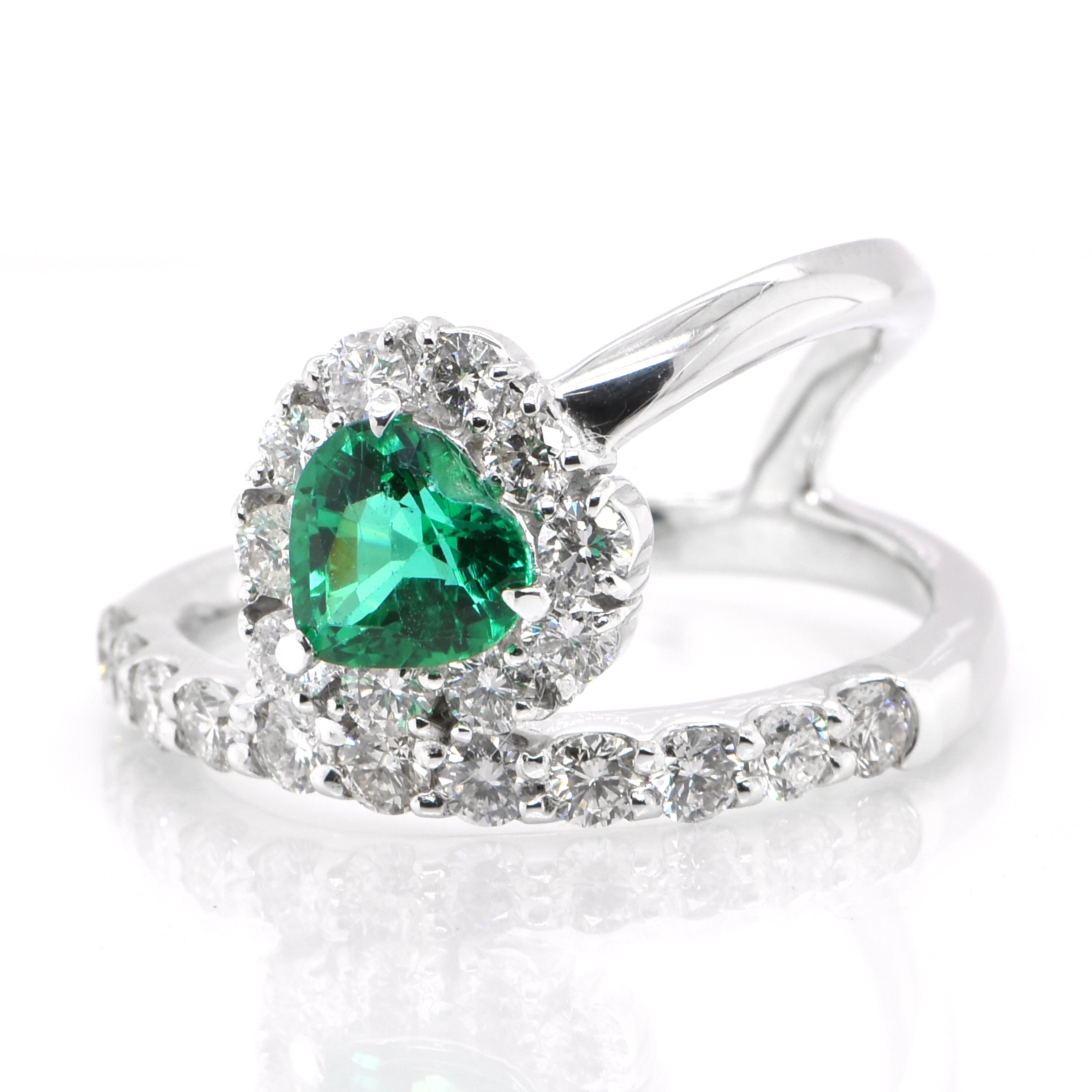 A stunning ring featuring a 0.85 Carat Natural Zambian Emerald and 1.07 Carats of Diamond Accents set in Platinum. People have admired emerald’s green for thousands of years. Emeralds have always been associated with the lushest landscapes and the