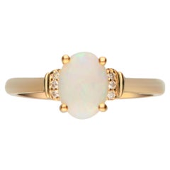 0.85 Carat Natural Opal and Diamond 14 Karat Yellow Gold Ring