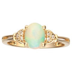 0.85 Carat Oval Cab Ethiopian Opal Diamond Accents 10K Yellow Gold Ring