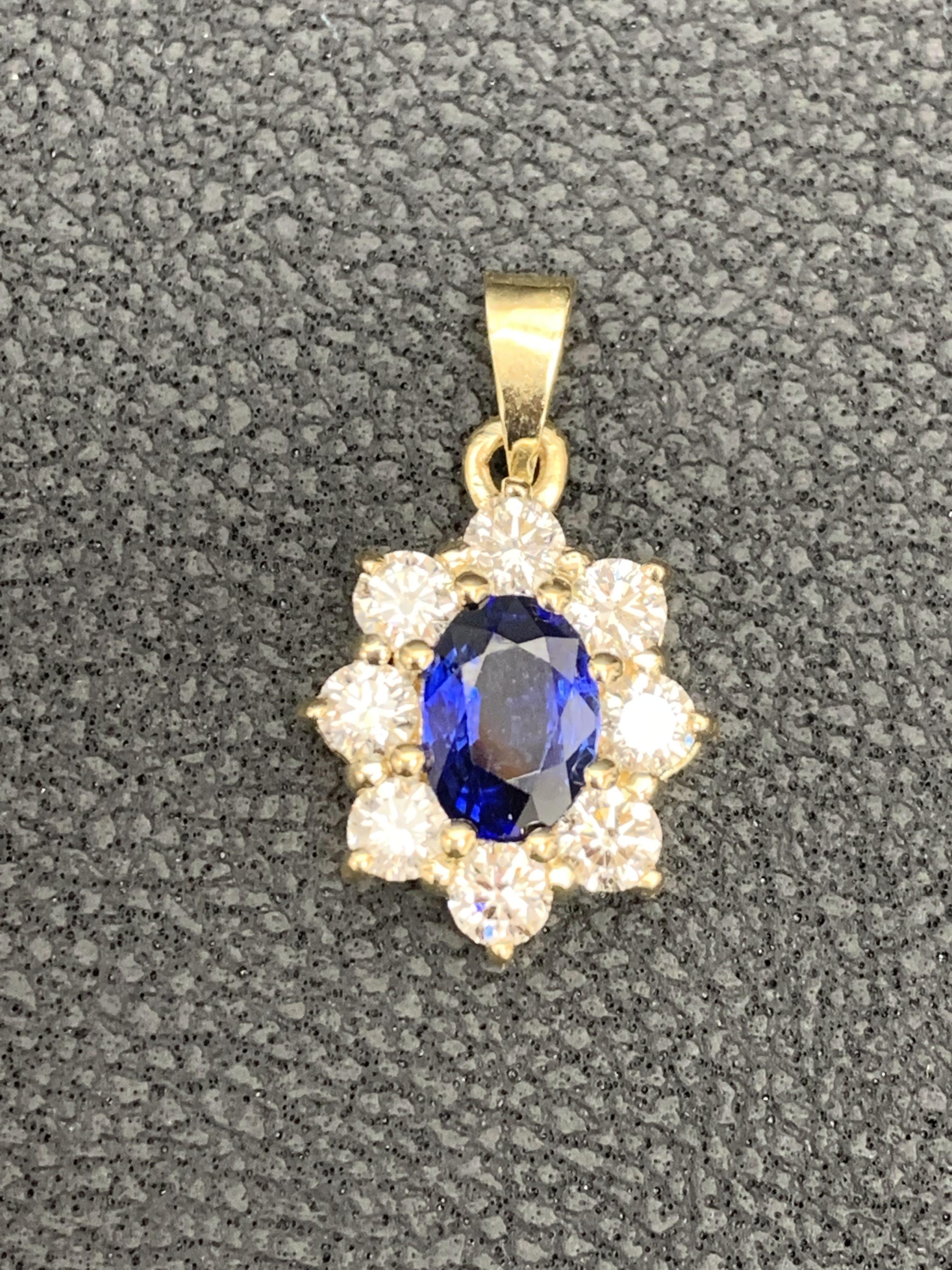 A simple floral motif pendant necklace showcasing a vibrant 0.85-carat oval cut blue sapphire, surrounded by 0.75 carats of 8 round diamonds. Made in 14 karats yellow gold.

Style available in different price ranges. Prices are based on your