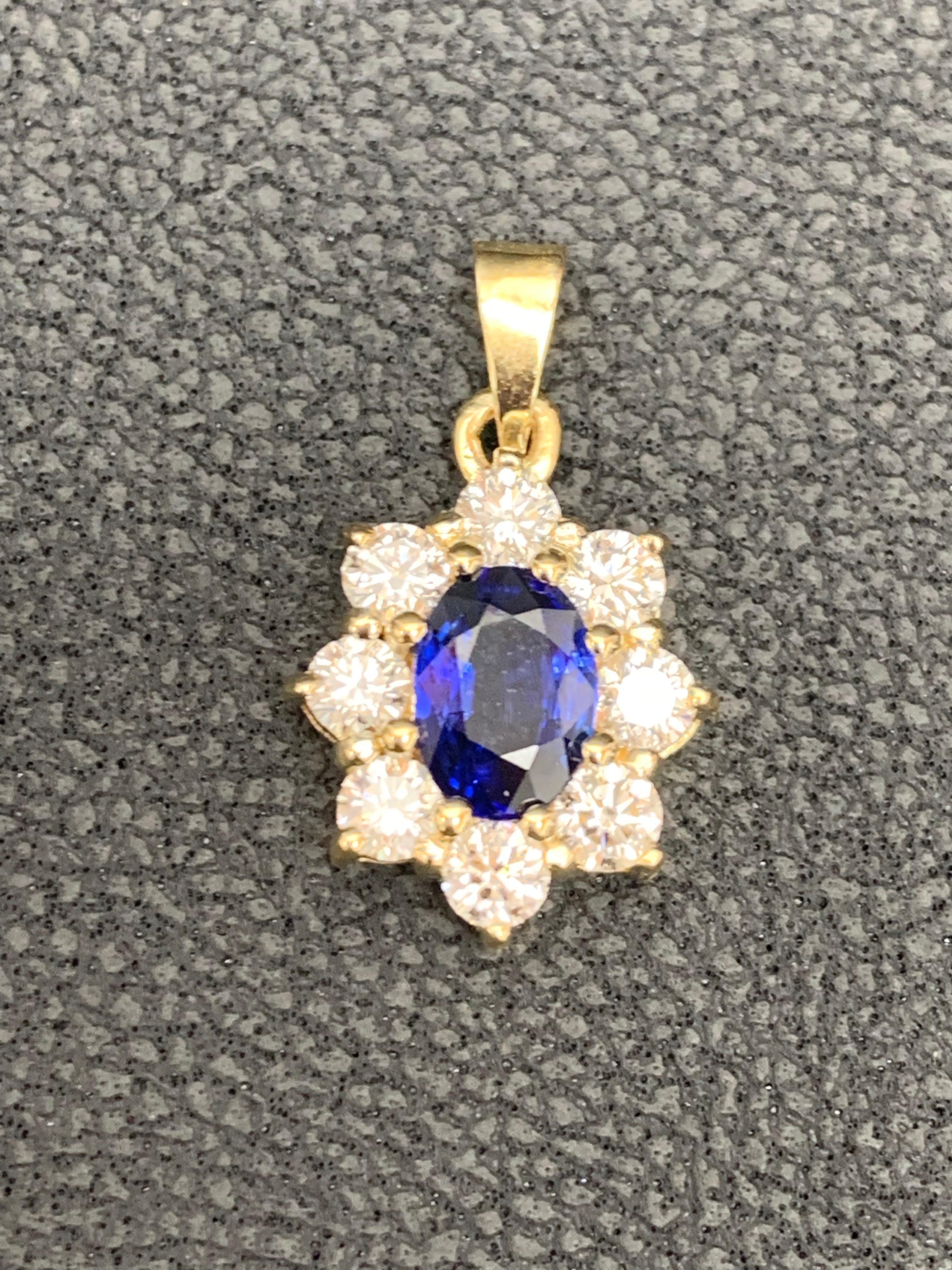Modern 0.85 Carat Oval Cut Blue Sapphire and Diamond Halo Flower Pendant Necklace For Sale