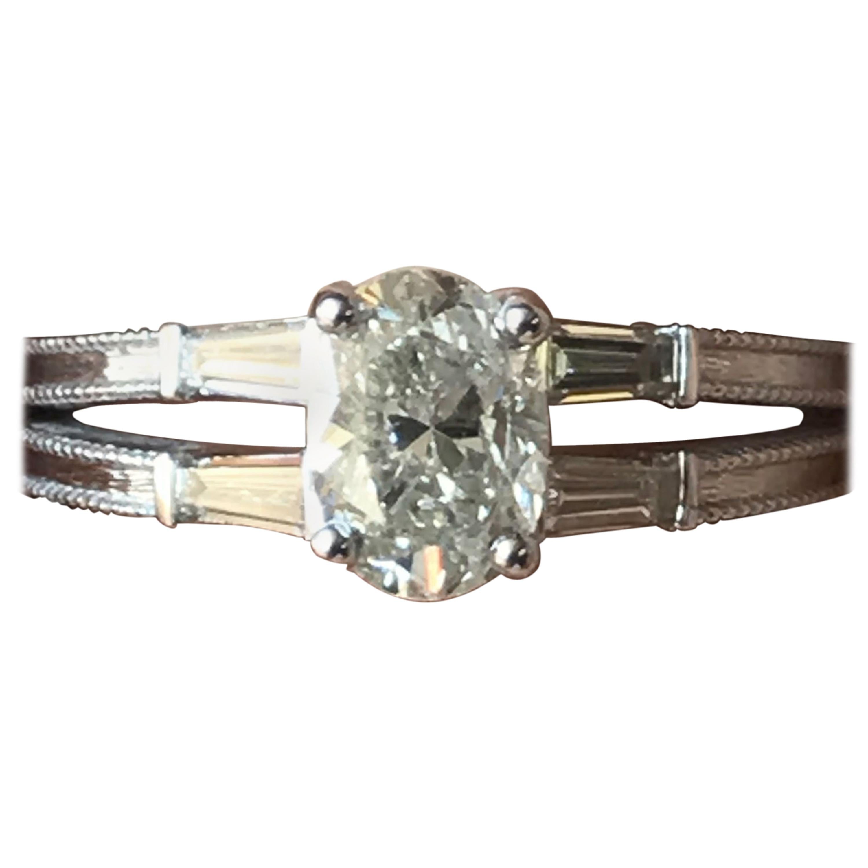 0.85 Carat Oval Diamond Baguette Engagement Ring 14 Karat, Ben Dannie For Sale