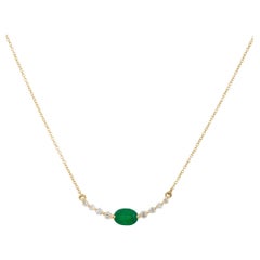 0.85 Carat Oval Emerald and Diamond Curved Bar Necklace 14 Karat In Stock