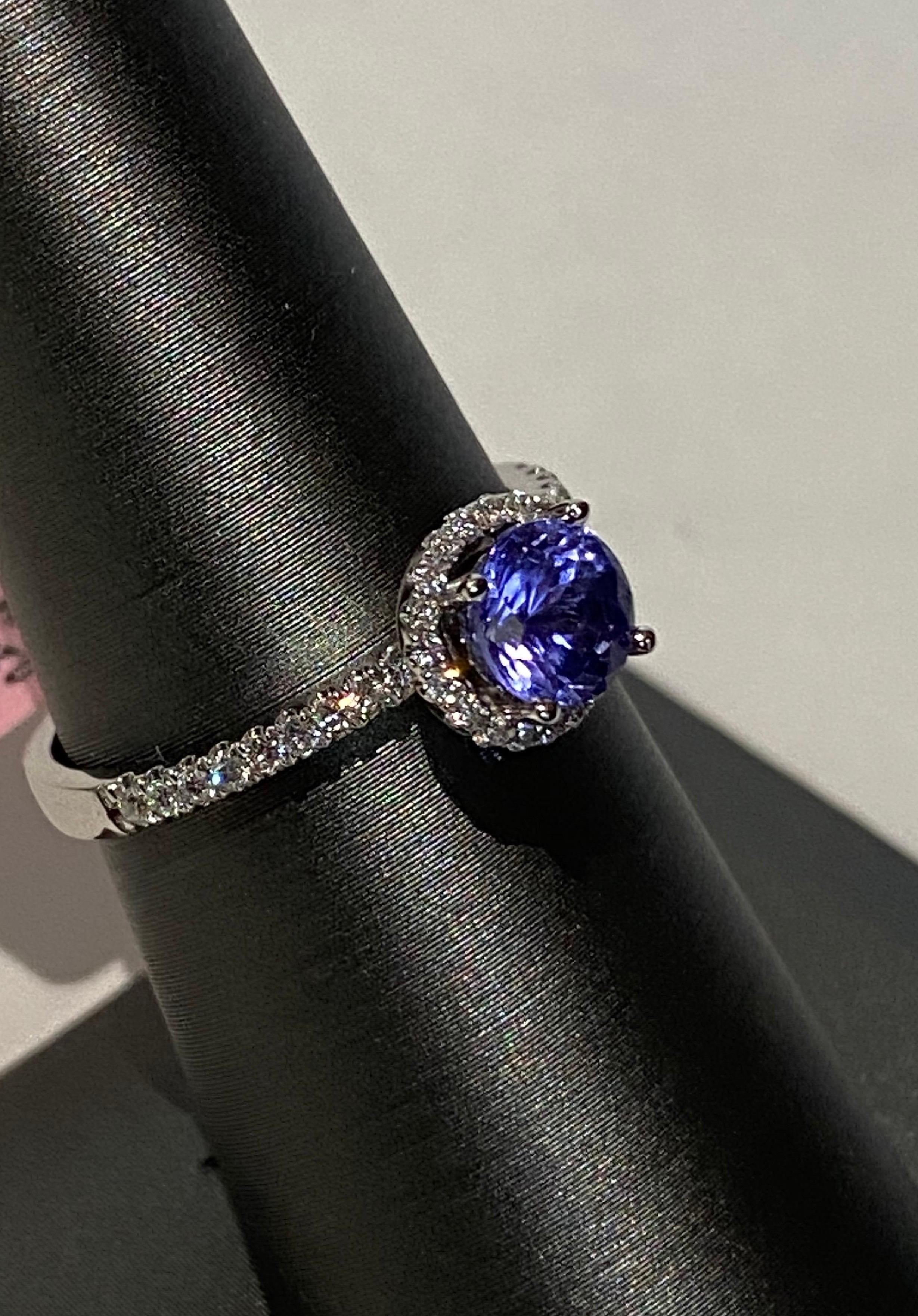 Artisan 0.85 Carat Round Tanzanite Diamond Halo Ring For Sale