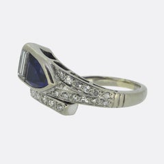 Anello incrociato con zaffiro e diamante da 0,85 carati