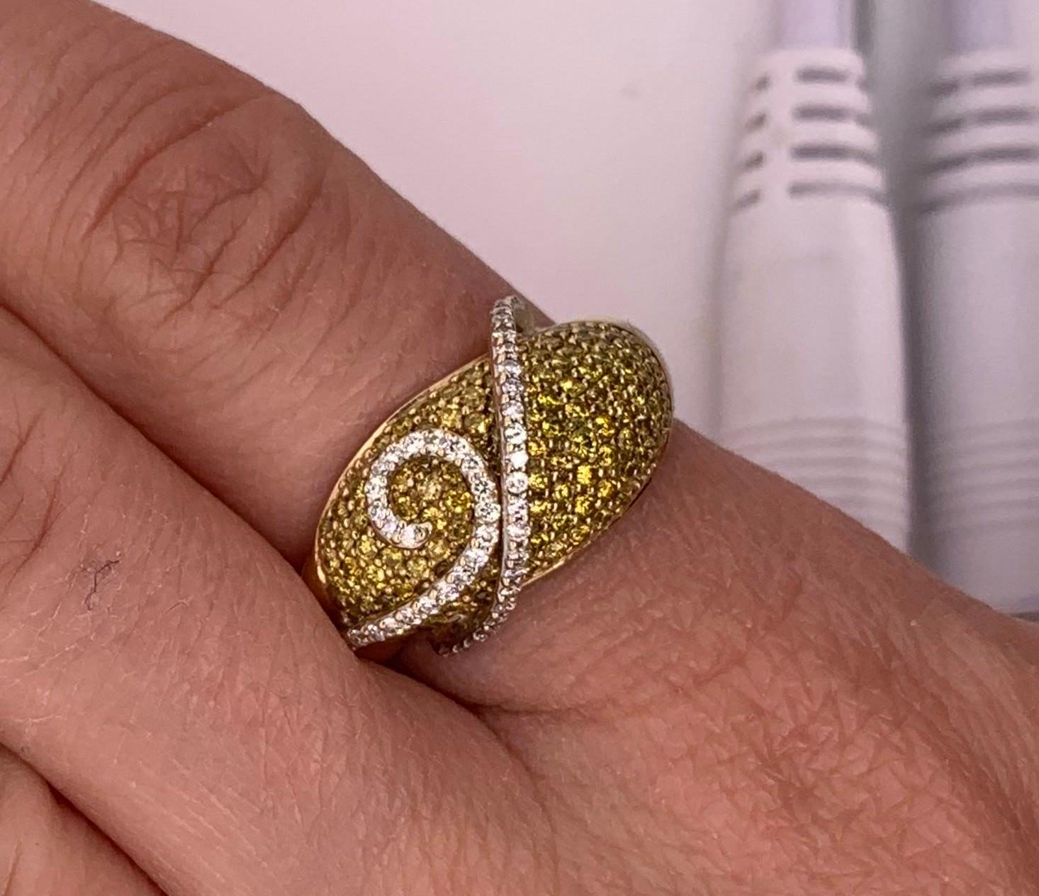Material: 14k Yellow Gold 
Diamonds: Brilliant Round Yellow Diamonds at 0.85 Carats- SI Clarity 
Diamond Details: Brilliant Round White Diamonds at 0.15 Carats. SI Clarity / H-I Color. 
Ring Size: 7.75. Alberto offers complimentary sizing on all