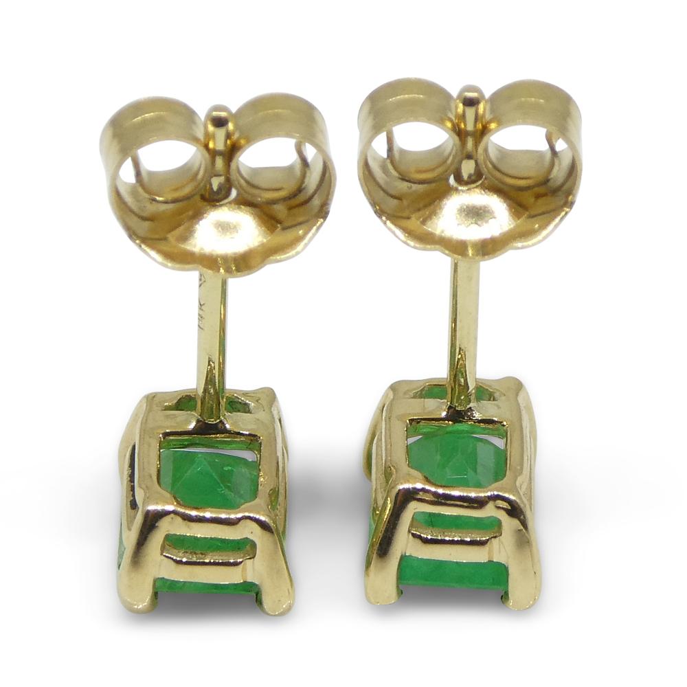 0.85ct Emerald Cut Green Colombian Emerald Stud Earrings set in 14k Yellow Gold For Sale 14