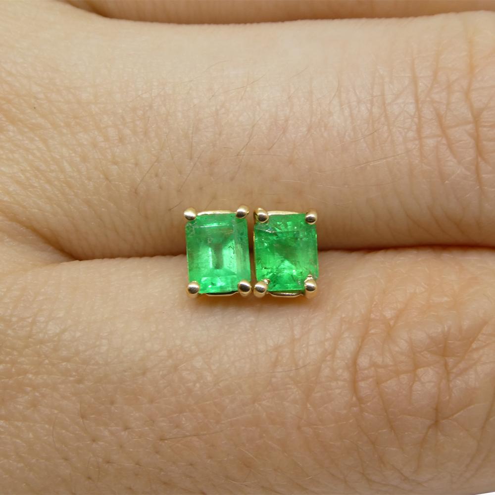 Description:

Stone Type: Emerald
Number of Stones: 2
Weight: 0.85 carats total weight
Measurements: 5.21 x 4.08 mm, 5.05 x 4.14 mm
Shape: Emerald Cut
Cutting Style: Crown: Step Cut
Cutting Style: Pavilion: Step Cut
Transparency: