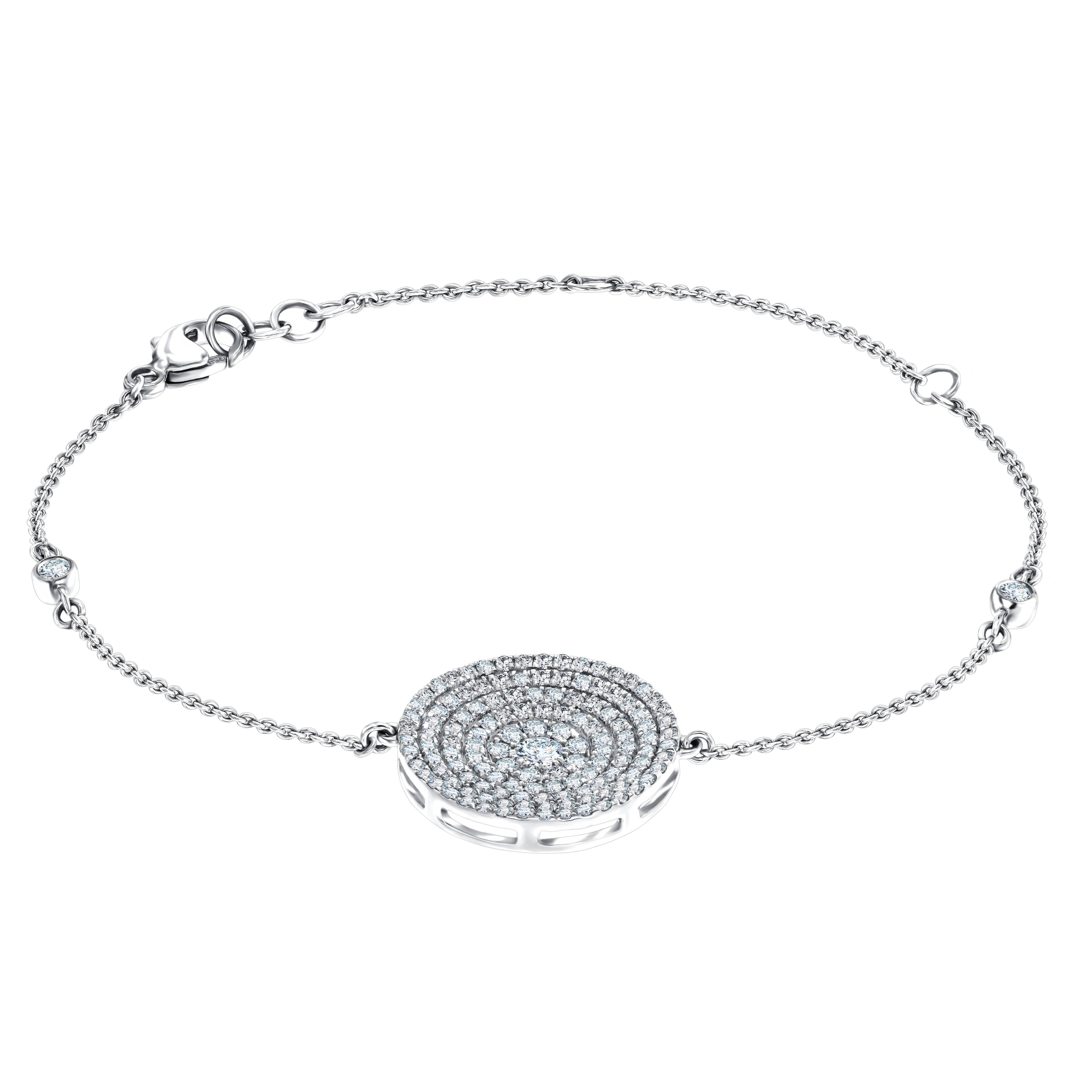 Concave disc of 0.85 carat H-SI micro set diamonds in a concentric circles is the focal point of this otherwise delicate bracelet with an adorable diamond accented chain. Set in 18 karat white gold and featuring an adjustable chain. The weight of