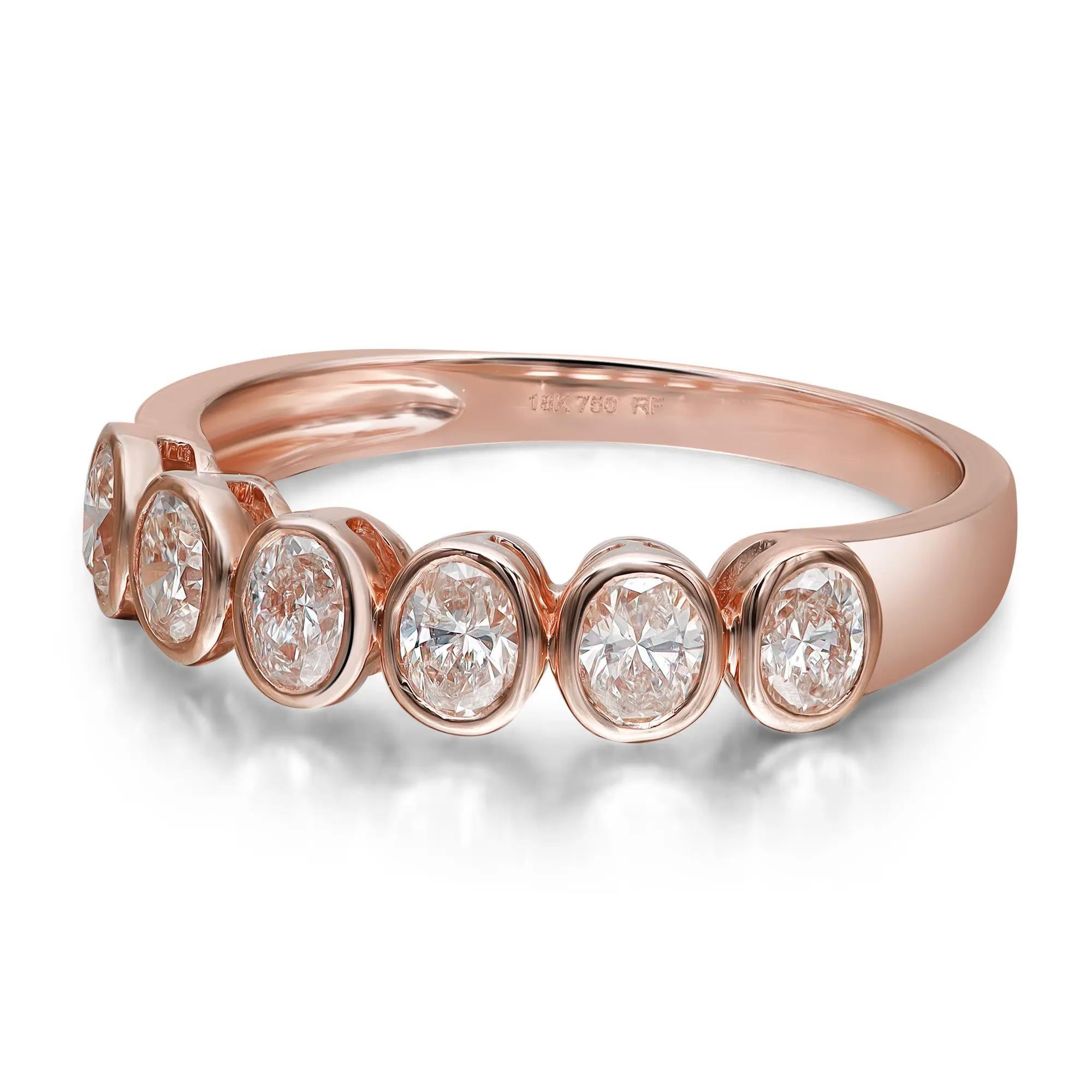 Celebrate everlasting love with this enchanting eternity band ring. Crafted in high polished 18K rose gold. Showcasing 6 bezel set oval cut dazzling diamonds weighing 0.85 carat. Diamond quality: color G-H and clarity VS-SI. Ring size: 6.75. Width: