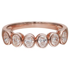 Anello a fascia per l'eternità con diamante taglio ovale da 0,85cttw con castone in oro rosa 18k