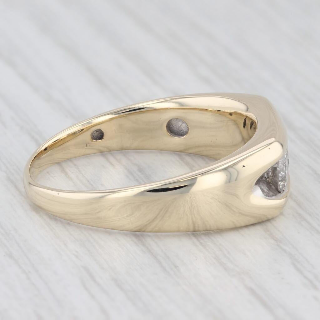 Gemstone Information:
- Natural Diamonds -
Total Carats - 0.85ctw
Cut - Round Brilliant
Color - I - J
Clarity - I1 - I2

Metal: 10k Yellow Gold
Weight: 6.6 Grams 
Stamps: 10k
Face Height: 8.3 mm 
Rise Above Finger: 3.5 mm
Band / Shank Width: 2.3