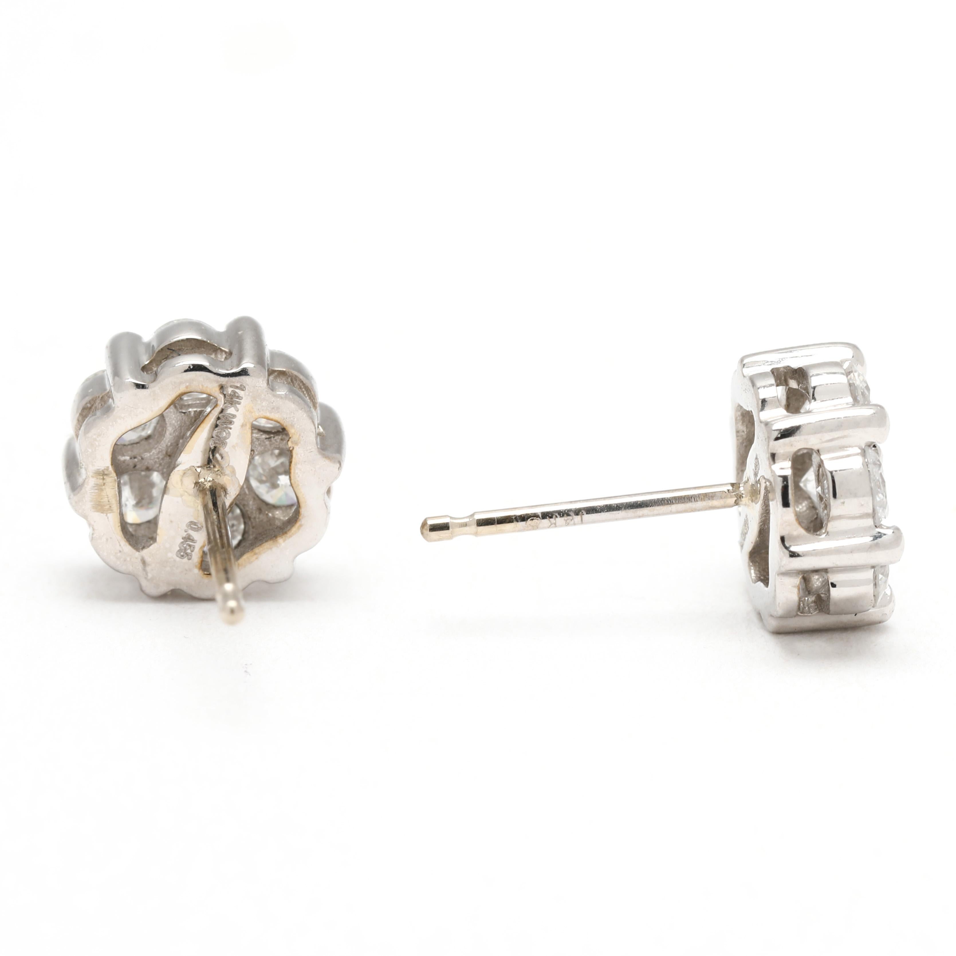 Pierres :
diamant, 14
taille ronde brillante
2.5 mm
environ .85 carats au total
Couleur GH/ Clarté SI2-I1

Longueur : 8 mm

Poids : 1,5 dwts. / 2,3 grammes

Estampilles : 