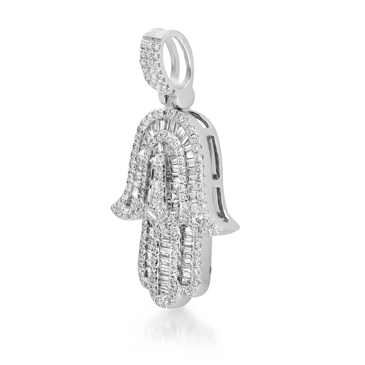 Approx. Diamond Weight: 0.76 carats.
Diamond Quality: G-H color, VS-SI clarity.
Metal: 18K White Gold.
Pendant Size: 1.1 inches x 0.6 inch.
Approx. Weight: 3.14 grams.

Product Disclaimer: Each of our jewelry pieces is uniquely crafted, meaning the