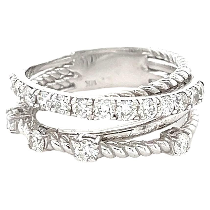 This ring has 17 Round Cut Diamonds that weigh 0.86 Carats (Clarity: SI, Color: F) 
Set in 14 Karat White Gold and it weighs 6.6 grams. 

Ring size is 7 and can be re-sized, free of charge.